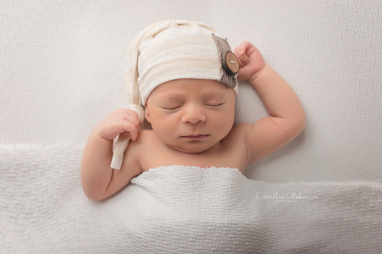 Neugeborenenfotografie Neugeborenenfotos Newbornportraits Newbornshoot Newborn Baby Photographer Babyshoot Babyfotografie Portrait Familie Cornelia Moebes Photography